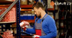 man holding Auto Parts in a store