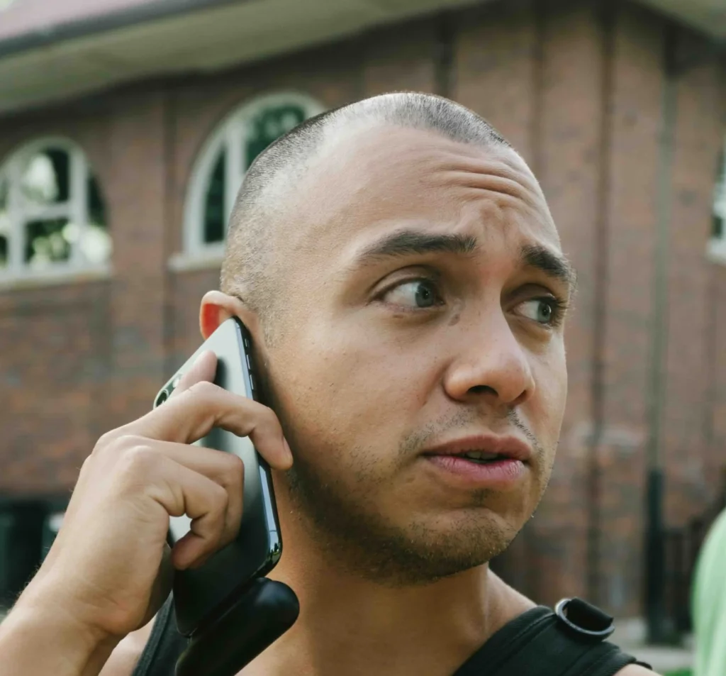 young man talking on the phone