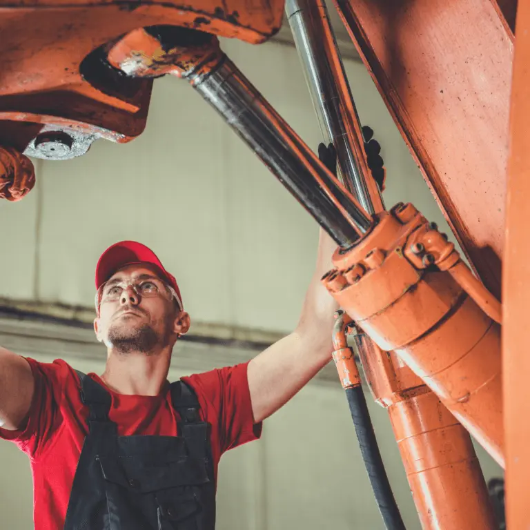 man working with machines
