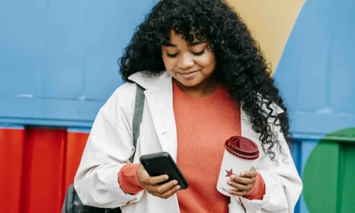 woman receiving a notification on her phone