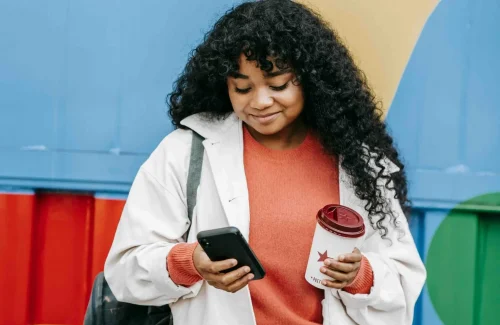 woman receiving a notification on her phone