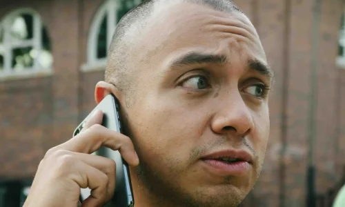 young man talking on the phone