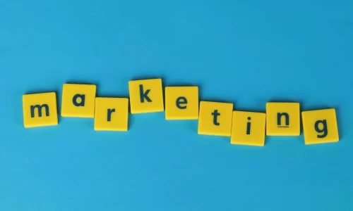 making the word marketing using letters from scrabble