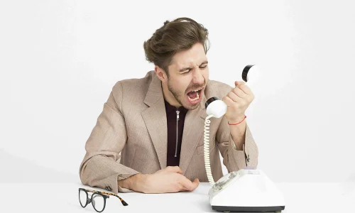 Man Shouting at the Phone