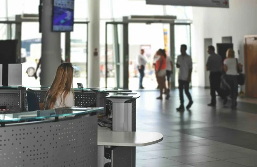 Woman Waiting on Front desk